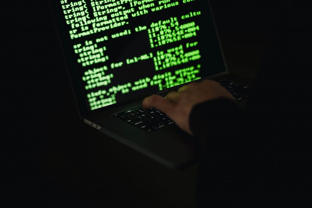 Ransomware Photo by Sora Shimazaki: https://www.pexels.com/photo/crop-hacker-typing-on-laptop-with-information-on-screen-5935787/